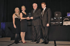 Black Gold CEO Gregg Halverson receiving Top Producer Award
