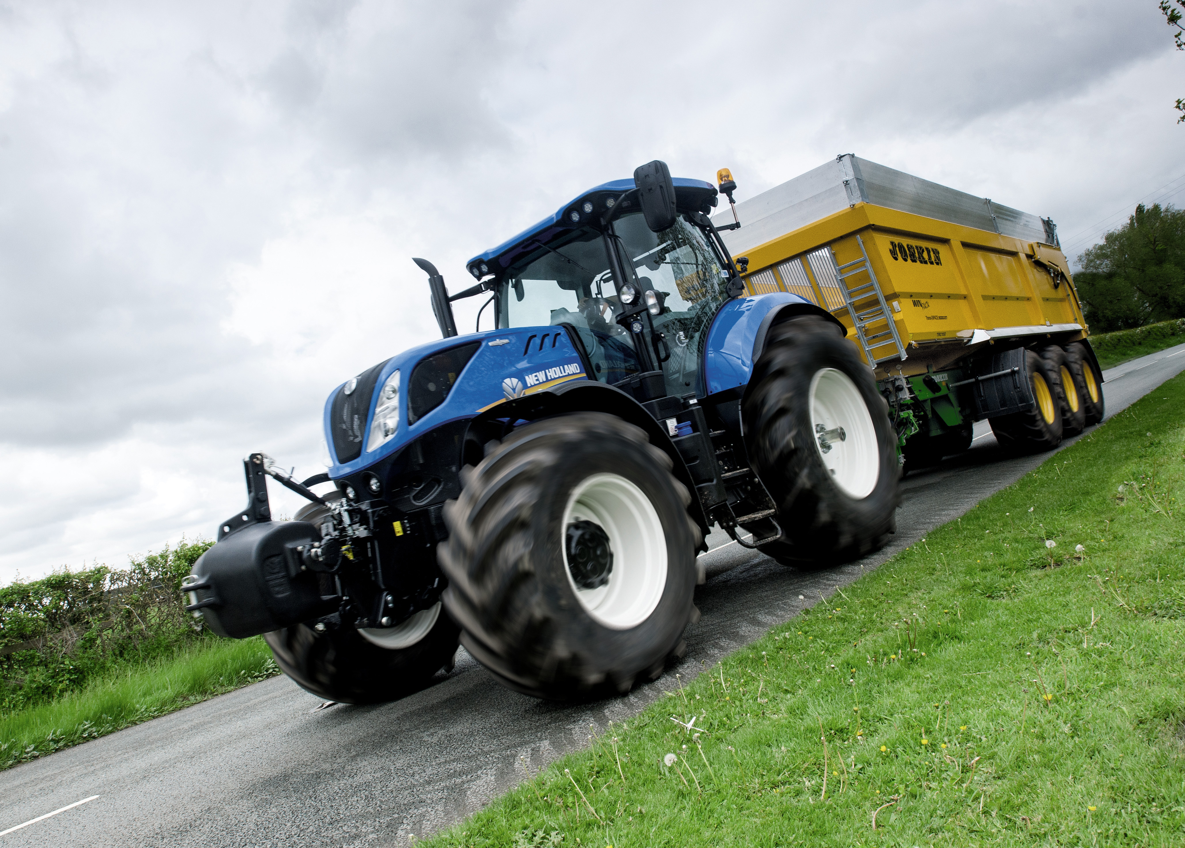 New holland цена. Трактор Нью Холланд. Трактор New Holland t9040. New Holland t10. New Holland t7 270.